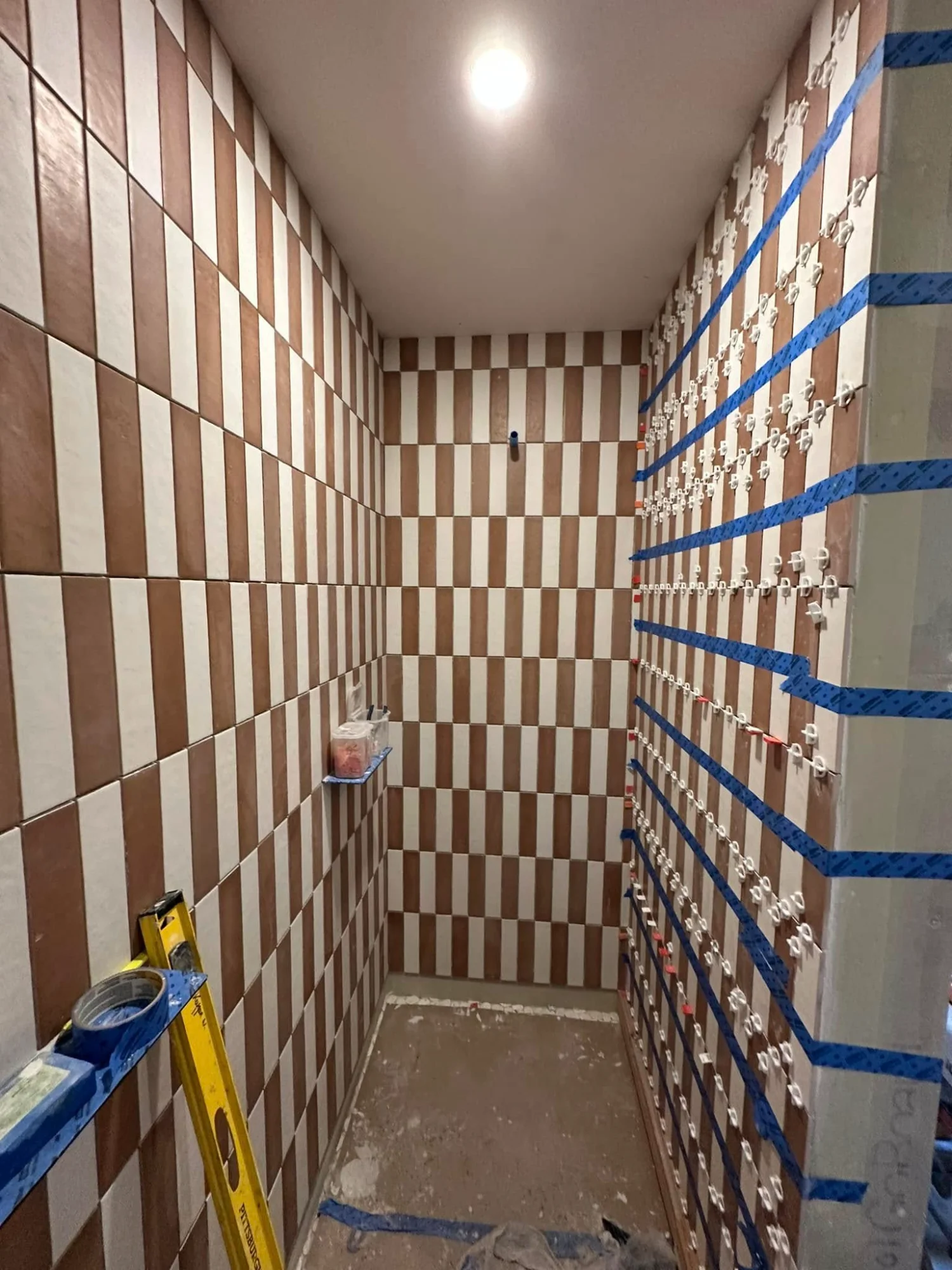 Terracotta checkerboard shower