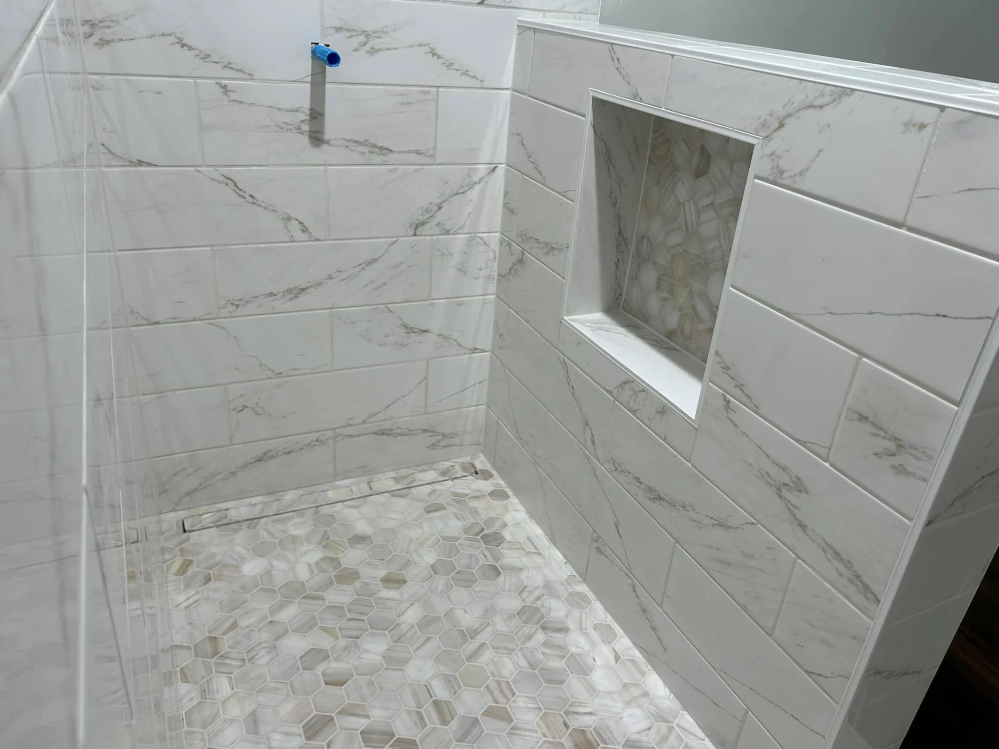 Marble shower with niche